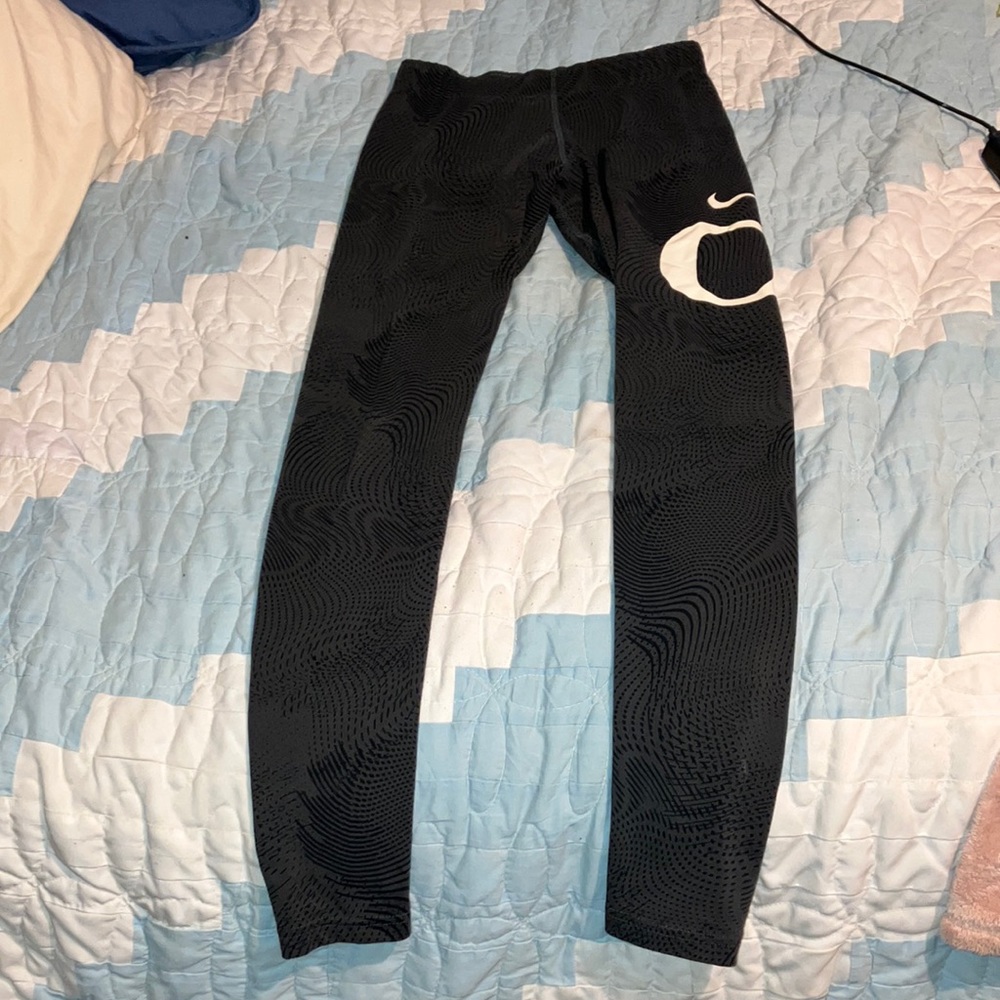 Grey Nike leggings.